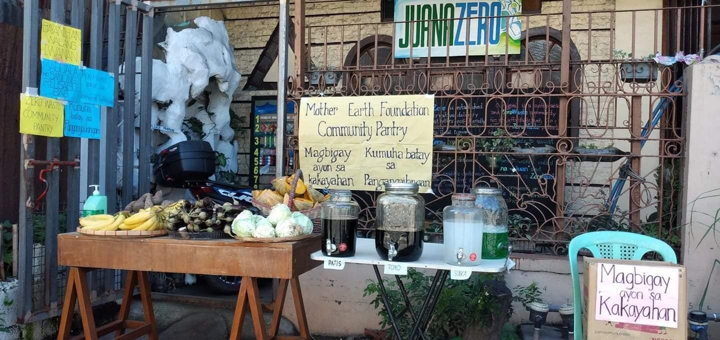 Waste workers at work in a community setting